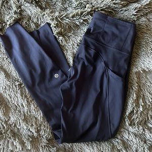 Black Lululemon size 6 yoga pants with pockets.